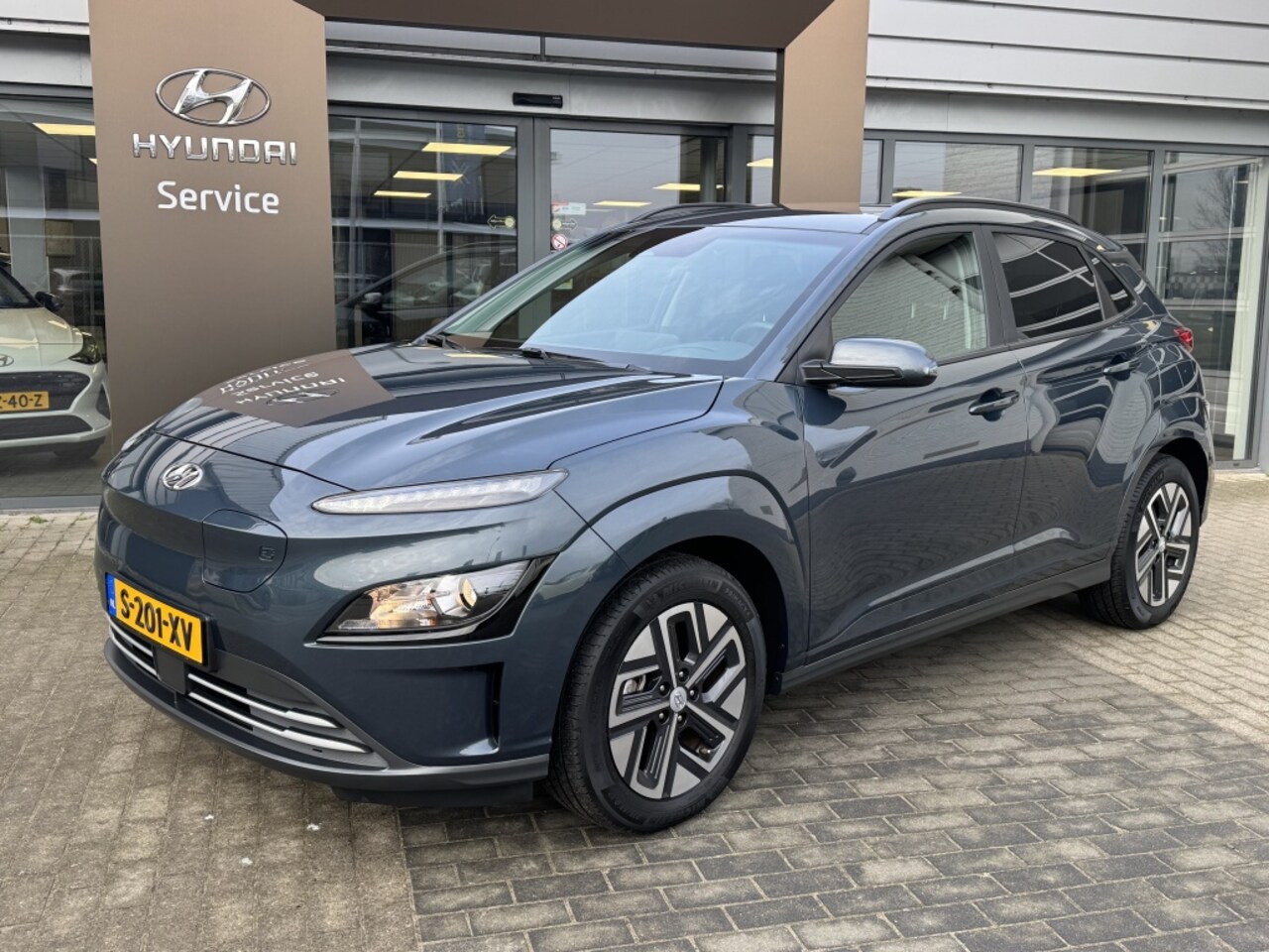 Hyundai Kona Electric - EV Fashion 64 kWh | 3 fase | Warmtepomp | Navigatie | Achteruitr - AutoWereld.nl