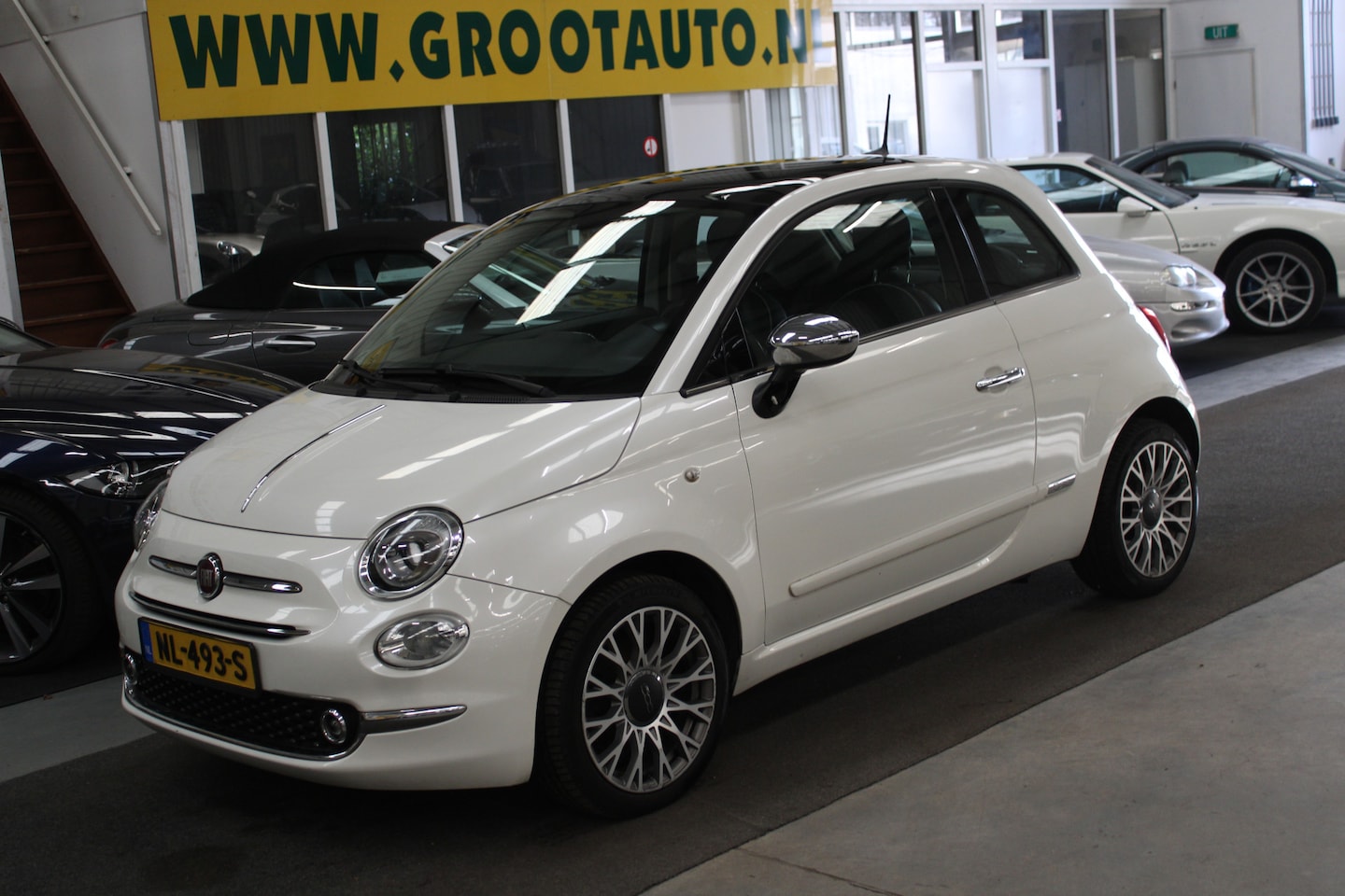 Fiat 500 - 1.2 Lounge Panoramadak, Cruise control, Navi, Isofix - AutoWereld.nl