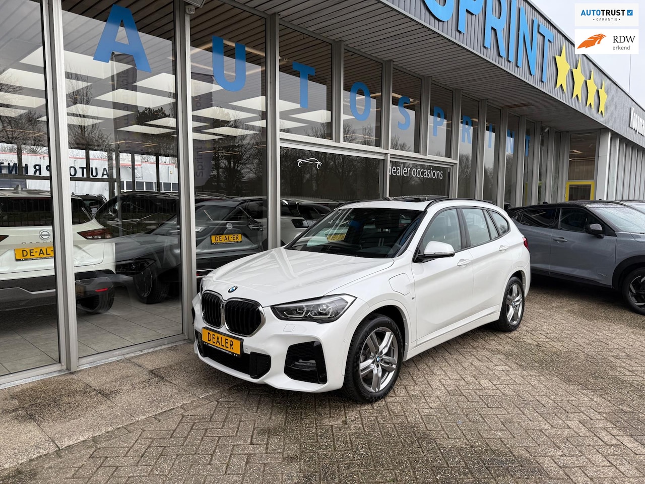 BMW X1 - XDrive25e Executive M-SPORT PHEV 220PK / PANORAMADAK / ELEKTRISCHE ACHTERKLEP - AutoWereld.nl