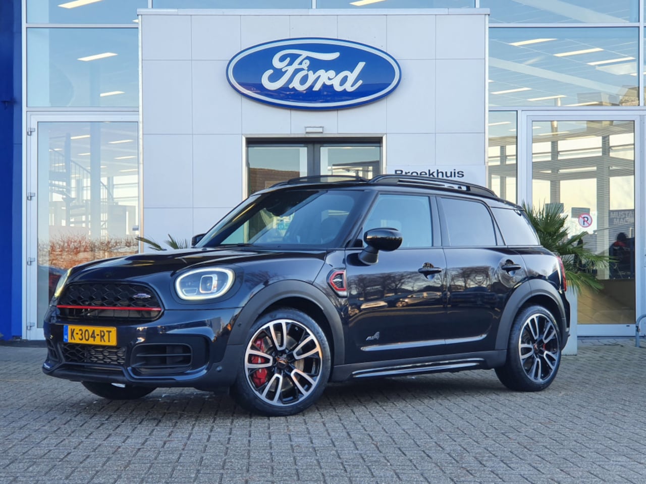 MINI Countryman - Mini 2.0 John Cooper Works ALL4 Chili | elektrisch glazen panorama-dak | lederen bekleding - AutoWereld.nl