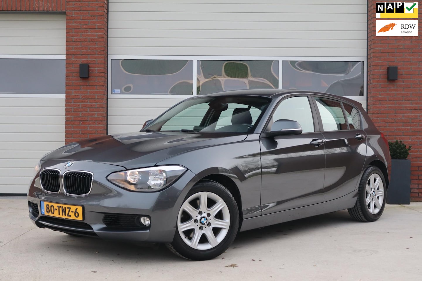 BMW 1-serie - 118i 170pk Business - Climate control - Navigatie - Cruise control - PDC - 2e Eigenaar - N - AutoWereld.nl