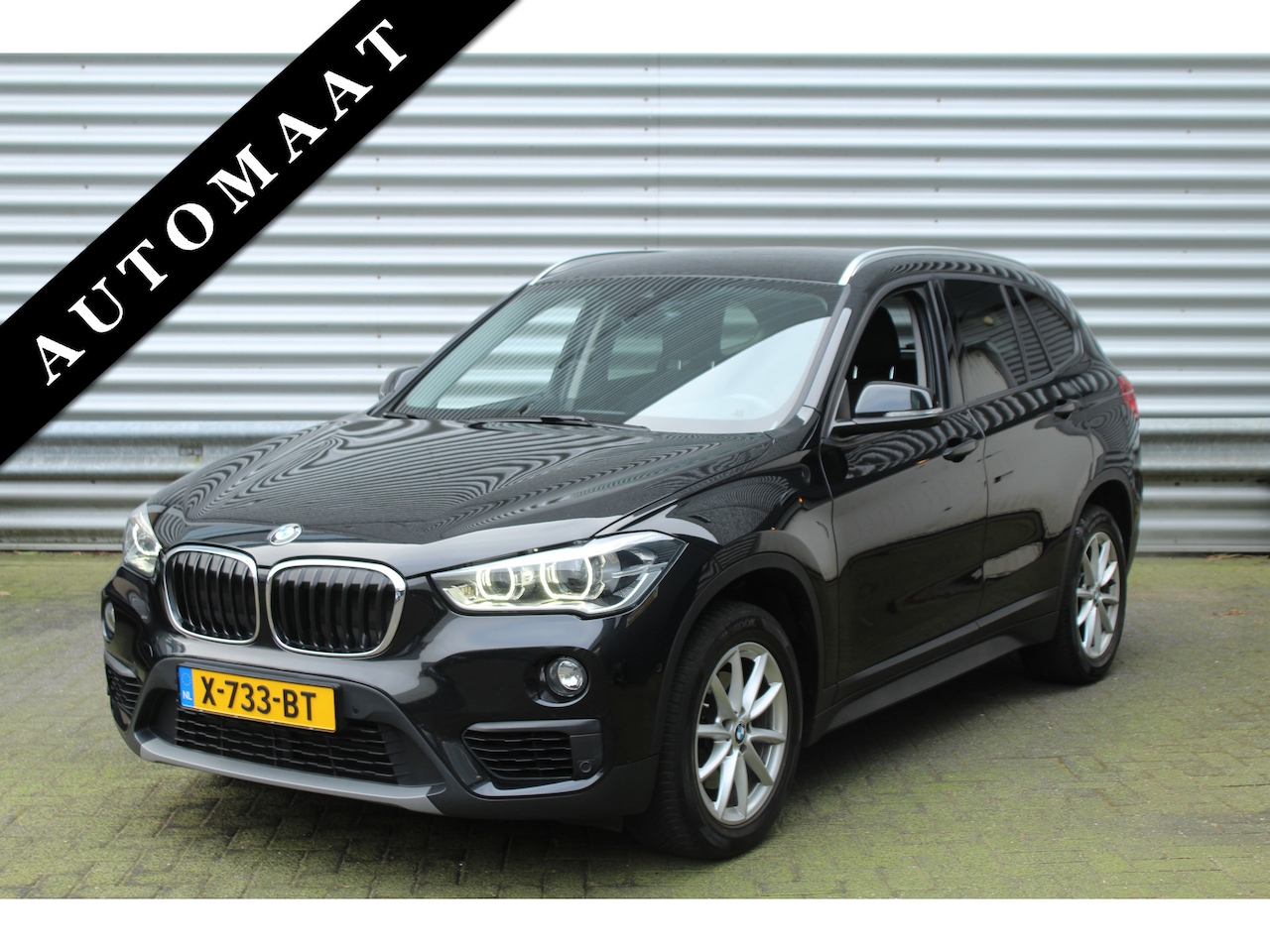 BMW X1 - sDrive18i 141pk High Executive Edition Clima Cruise Navi PDC El. Klep Keyless 17"LMV - AutoWereld.nl