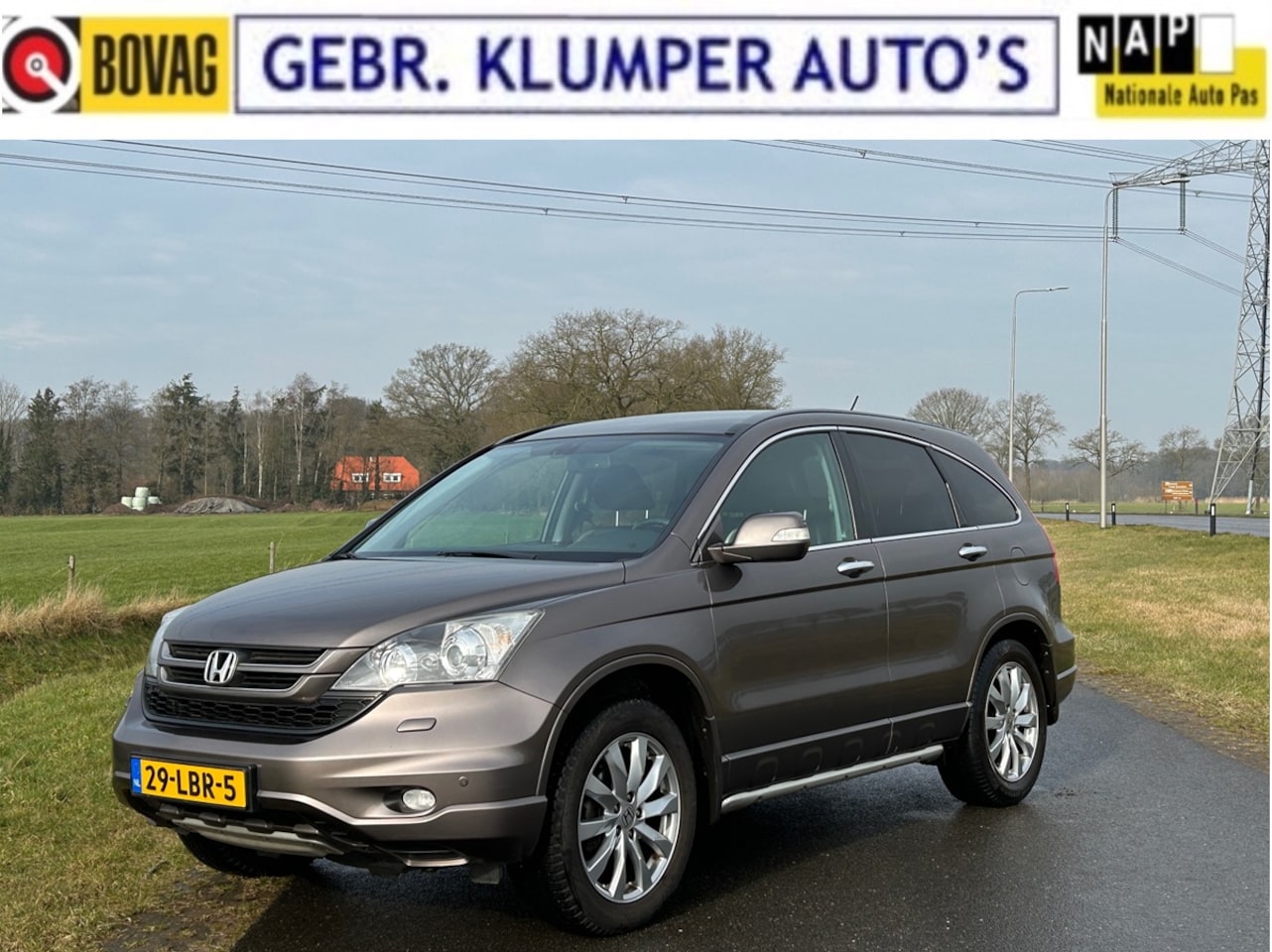 Honda CR-V - 2.0i Executive Leer, Cruise, ECC, Navi, Xenon, PDC, Haak, 2e Eigenaar - AutoWereld.nl