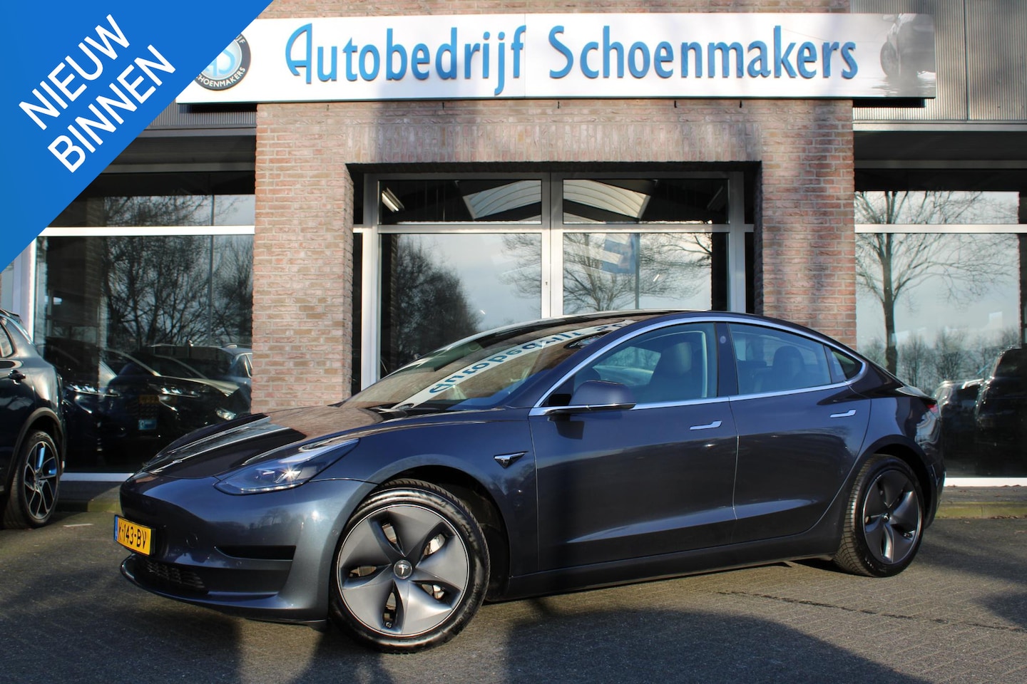 Tesla Model 3 - Standard RWD Plus 60 kWh AUTOPILOT PANO 360-CAMERA LEER 18"LMV DAB 2xPDC - AutoWereld.nl