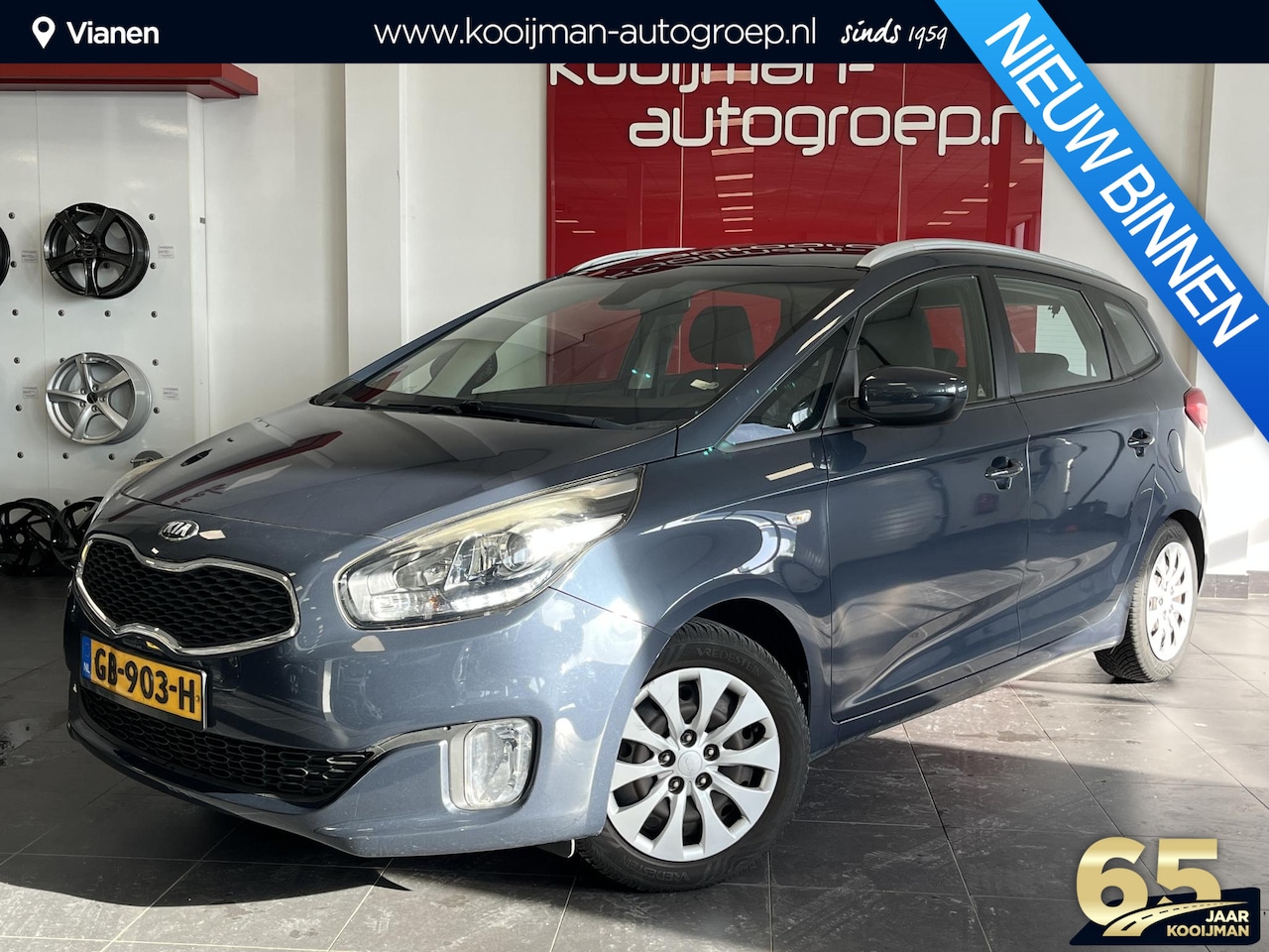 Kia Carens - 1.6 GDi ComfortLine 7 ZITS, Trekhaak, Cruise Control, Achteruitrij Camera, Ingebouwde Navi - AutoWereld.nl