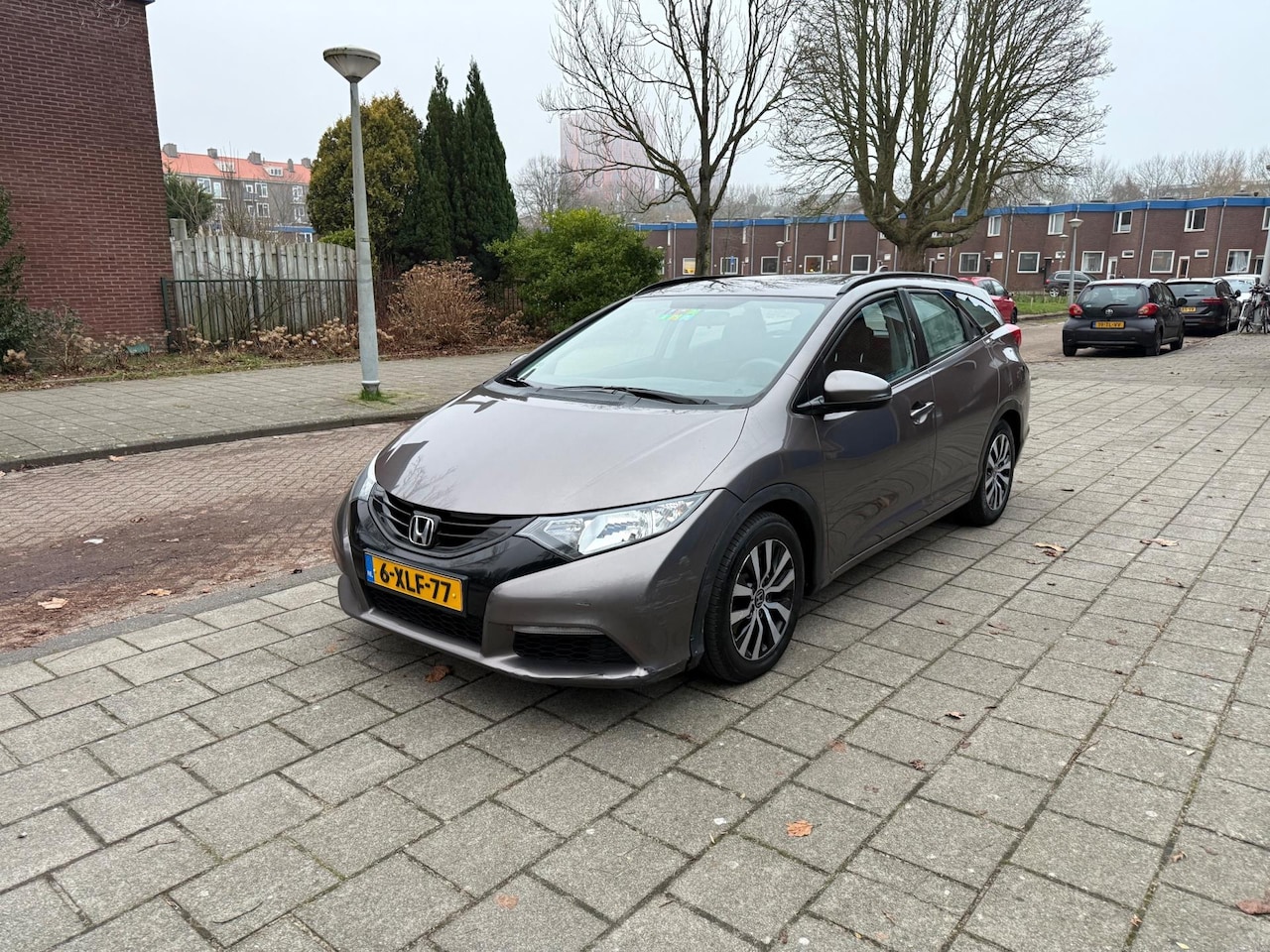 Honda Civic Tourer - 1.6D Comfort Wagon Airco Brown Metallic - AutoWereld.nl