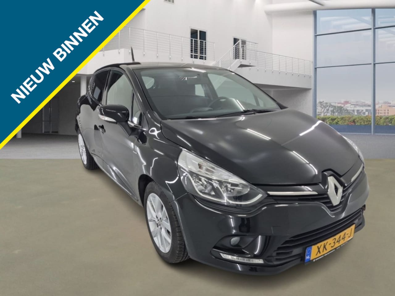 Renault Clio - 0.9 TCe LIMITED 5-DRS. + AIRCO/NAVI/LMV/PDC/CRUISE - AutoWereld.nl