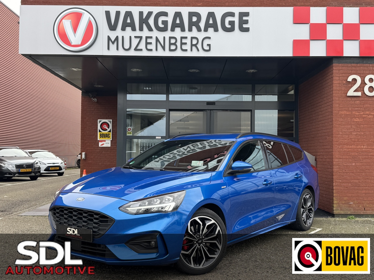 Ford Focus Wagon - 1.5 EcoBoost ST Line Business // ADAPTIVE CRUISE // NAVI // CAMERA // CLIMA // HUD DISPLAY - AutoWereld.nl