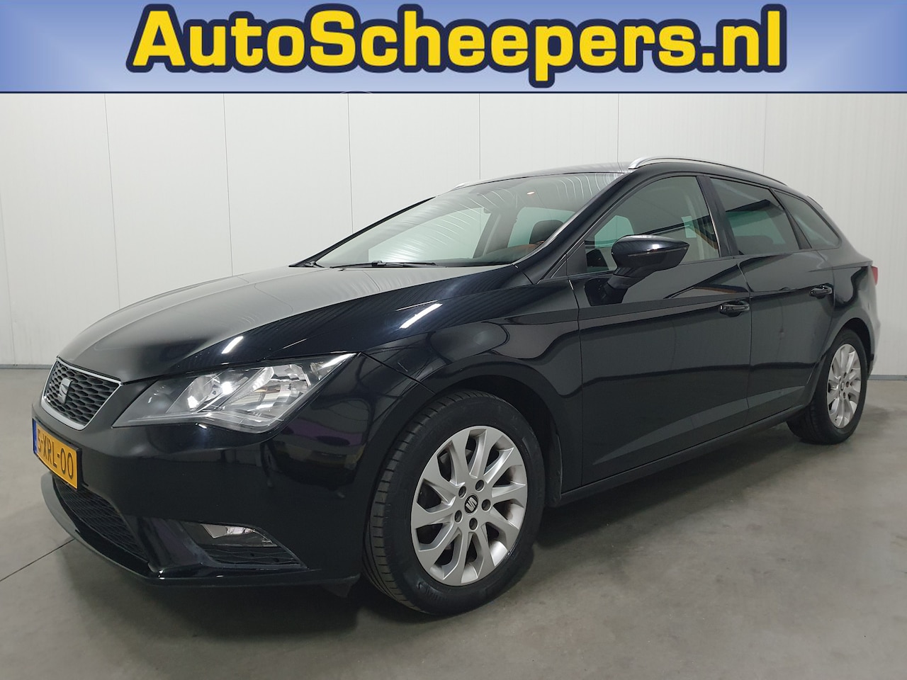 Seat Leon ST - 1.6 TDI Style Ecomotive NAVI/PDC/CRUISE/LMV/TRHAAK - AutoWereld.nl