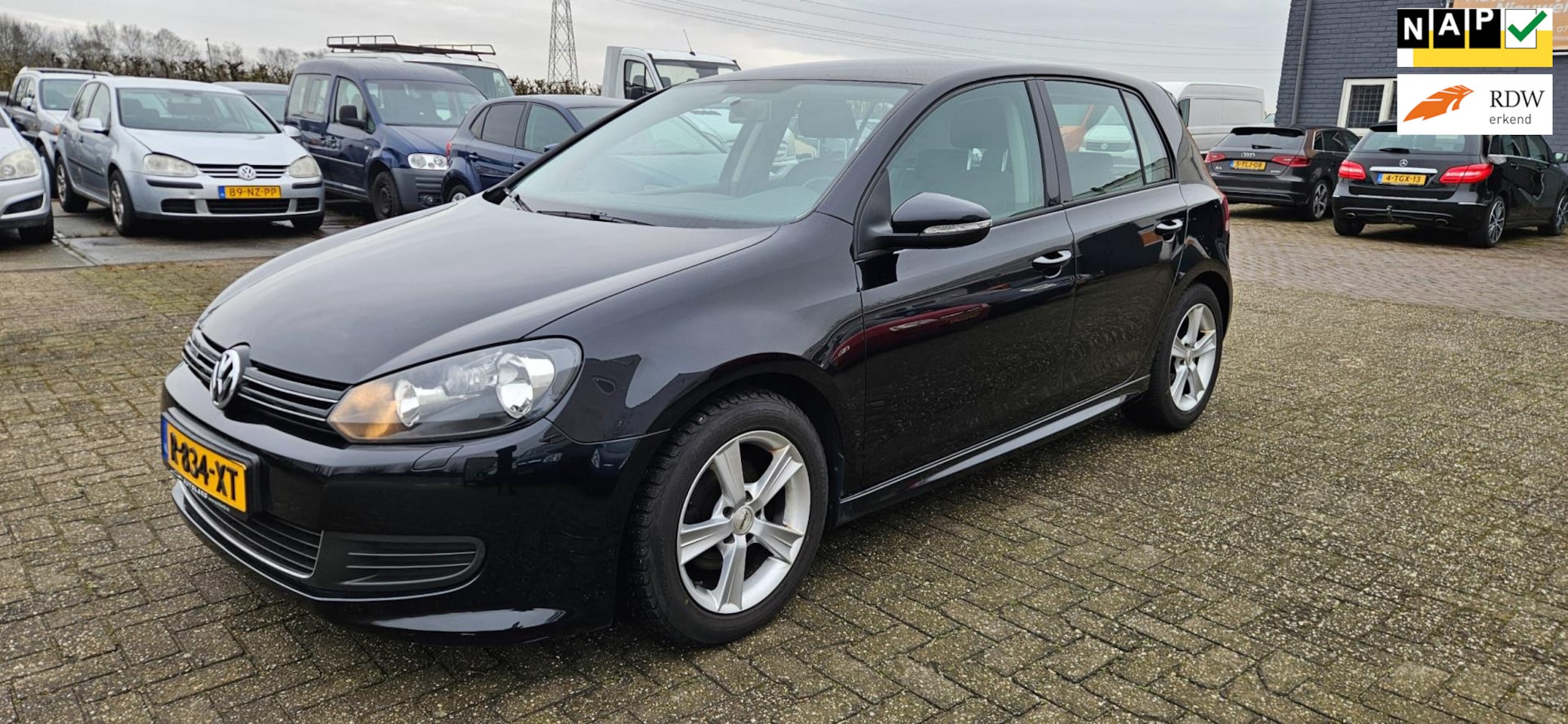 Volkswagen Golf - 1.6 TDI Sportline Lage km's R-line EURO5 - AutoWereld.nl