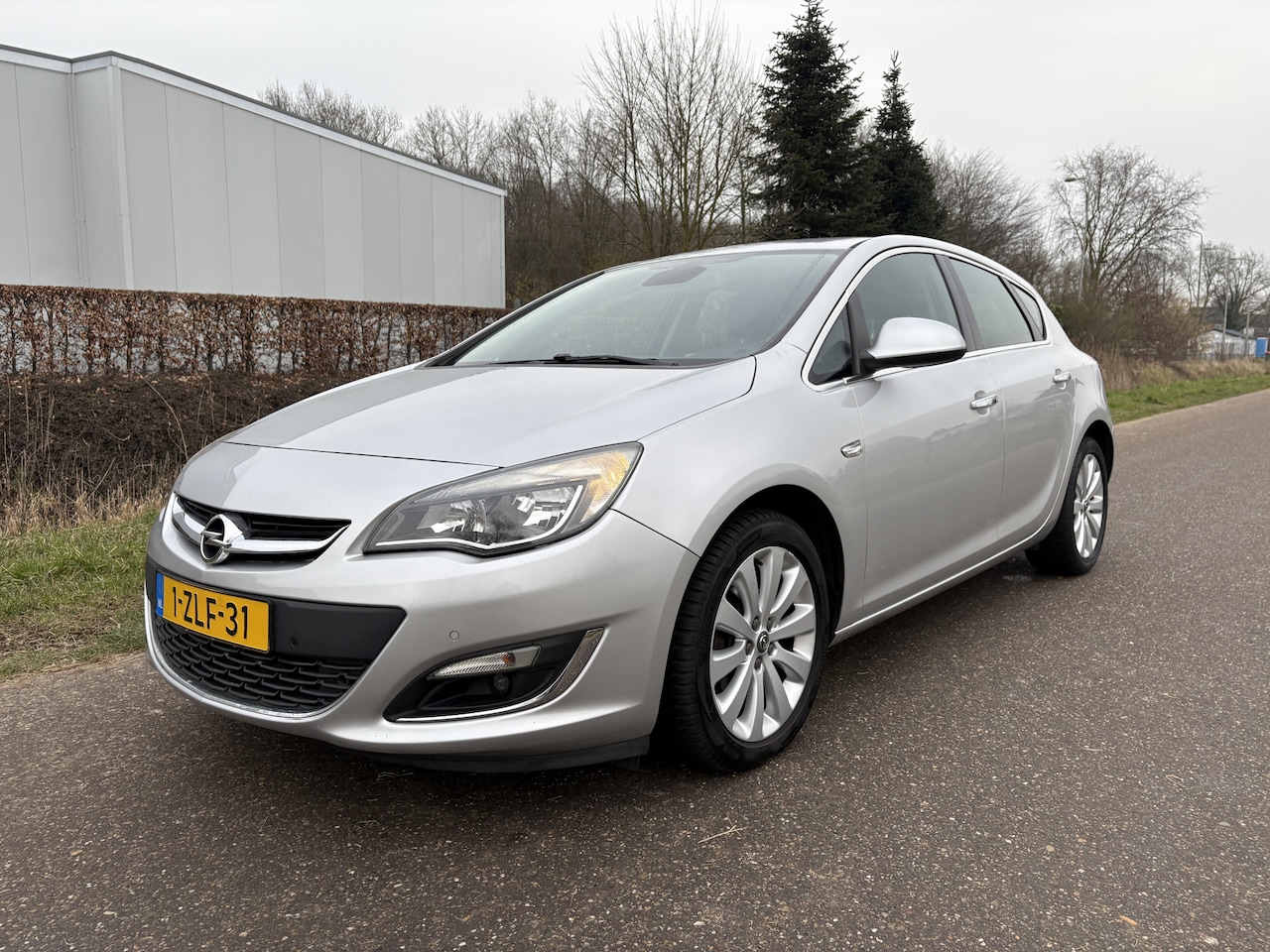 Opel Astra - 1.4 Turbo Cosmo / HALF LEER / NAVI / AIRCO / CRUISE - AutoWereld.nl