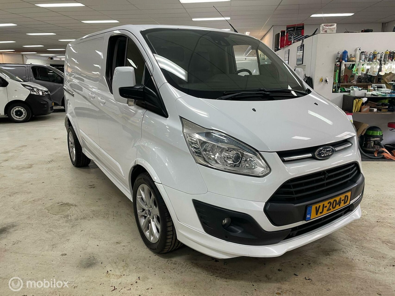 Ford Transit Custom - 2.2 TDCI L1H1 Sport - AutoWereld.nl