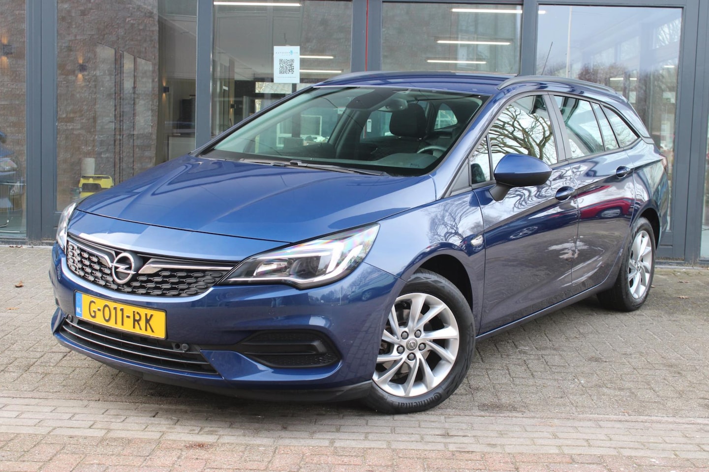 Opel Astra Sports Tourer - 1.2 Launch Edition | Cruise Control | Telefoonvoorbereiding | Parkeersensoren | Sportstoel - AutoWereld.nl