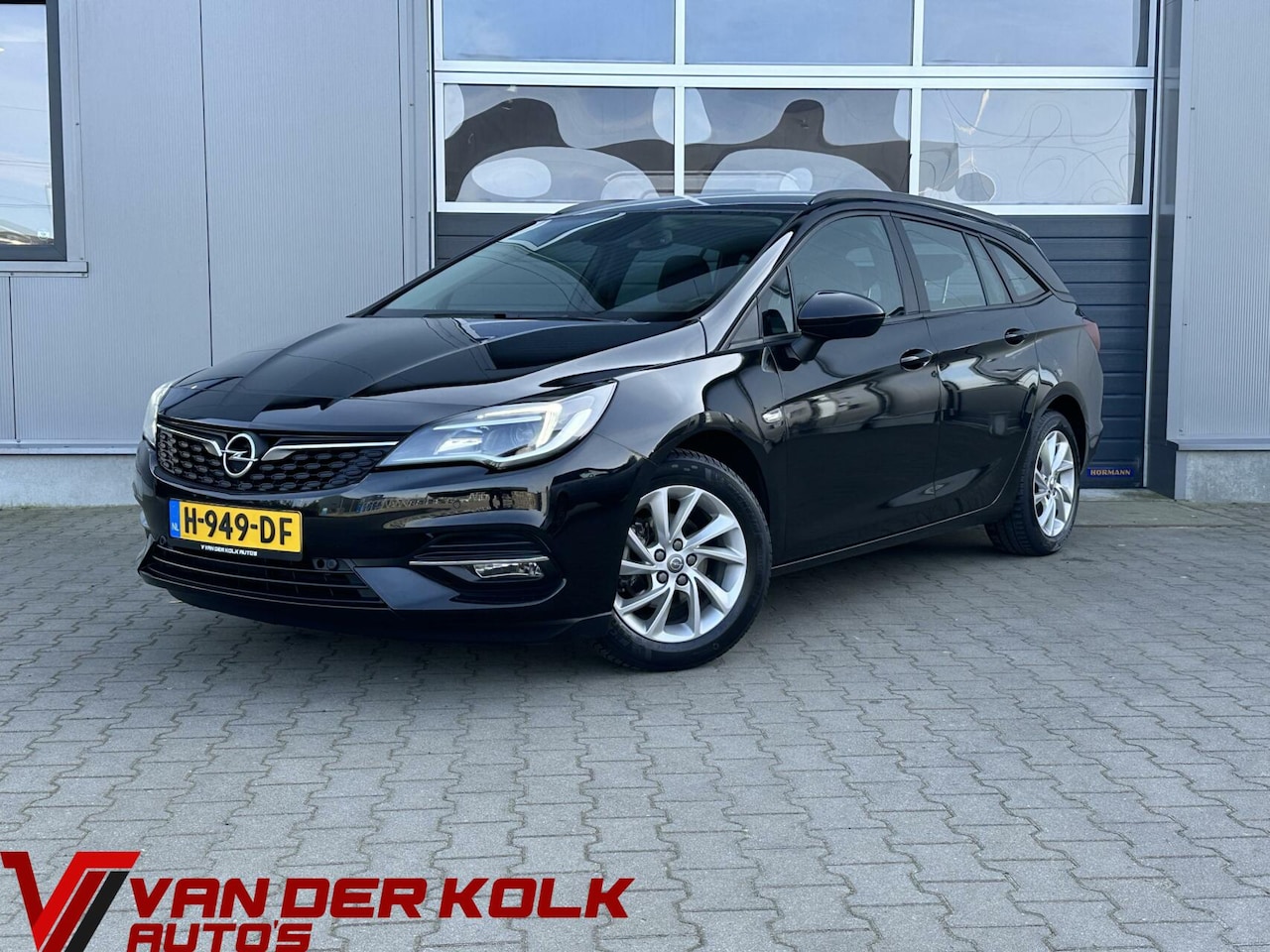 Opel Astra Sports Tourer - 1.2 Business LED Navi CarPlay Cruise Trekhaak - AutoWereld.nl