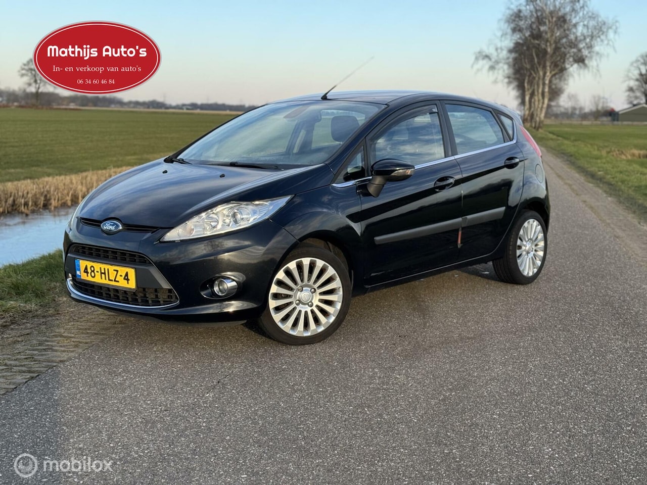 Ford Fiesta - 1.25 Titanium Airco 5 deurs Nieuwe APK! - AutoWereld.nl
