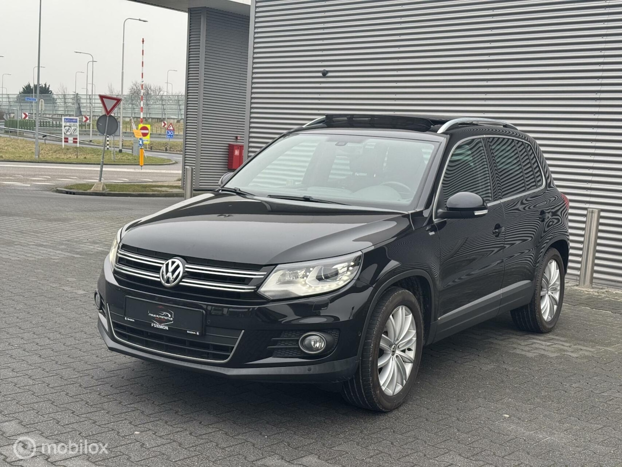 Volkswagen Tiguan - 1.4 TSI Sport&Style - AutoWereld.nl