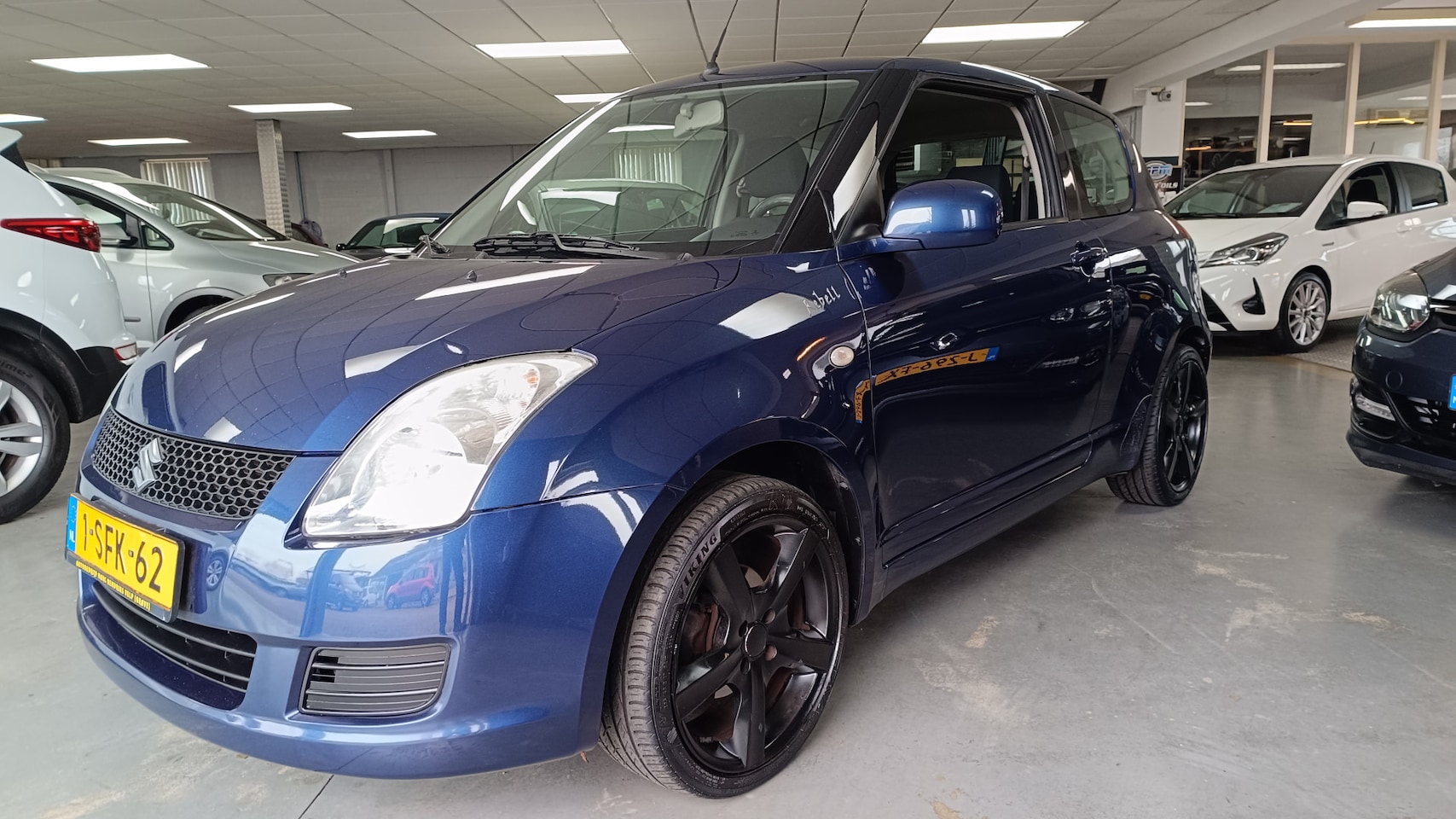 Suzuki Swift - 1.3 GA Airco Lmvlg Trekhaak - AutoWereld.nl