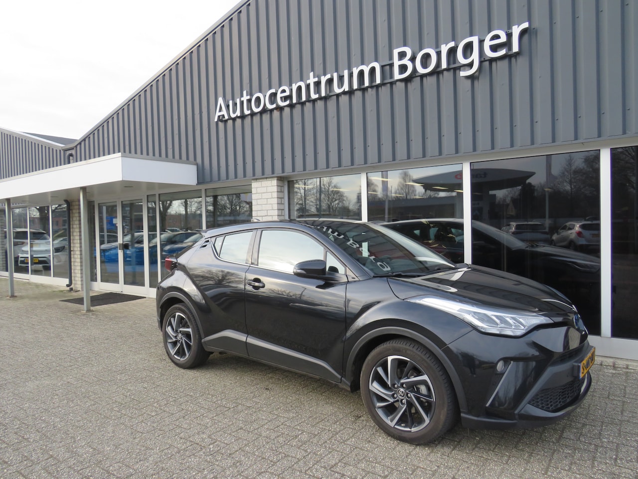 Toyota C-HR - 1.8 Automaat Hybrid Dynamic Navi/18"LM /Clima/Cruise/Camera/Trekhaak - AutoWereld.nl