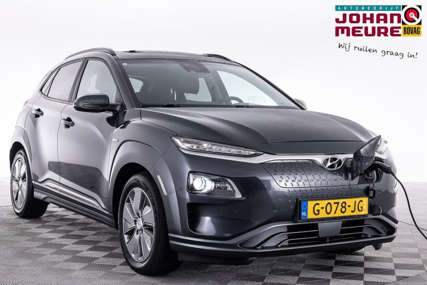 Hyundai Kona Electric - EV Premium 64 kWh | SCHUIFDAK | LEDER | NAVI | ECC ✅ 1e Eigenaar . - AutoWereld.nl