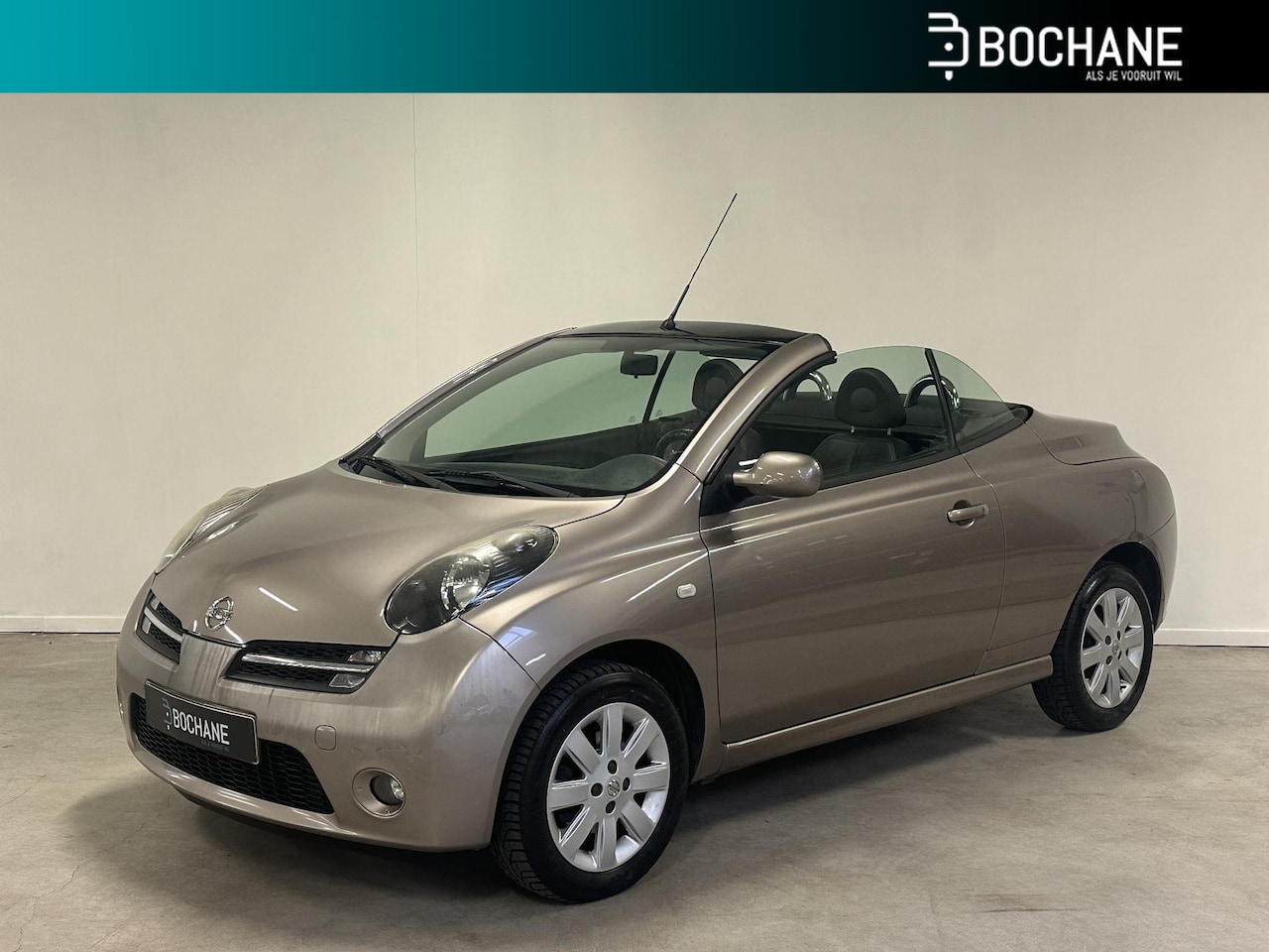 Nissan Micra - 1.6 Tekna | Karmann Cabriolet | Leer | Stoelverwarming | Automatische Airconditioning | - AutoWereld.nl