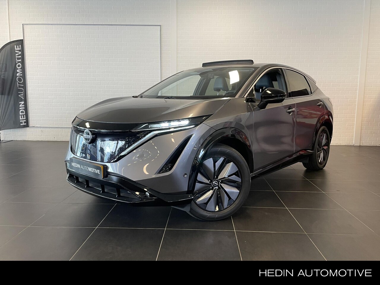 Nissan Ariya - 87 kWh Evolve Panorama dak | Leer | Navigatie | L.m. Velgen | Climate control - AutoWereld.nl