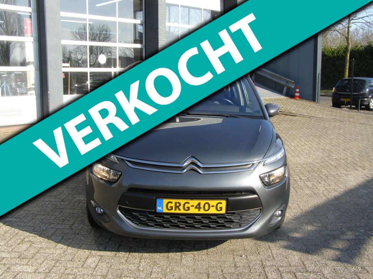 Citroën C4 Picasso - 1.6 VTi Intensive met airco en navigatie en cruise control en achter uitrij camera - AutoWereld.nl