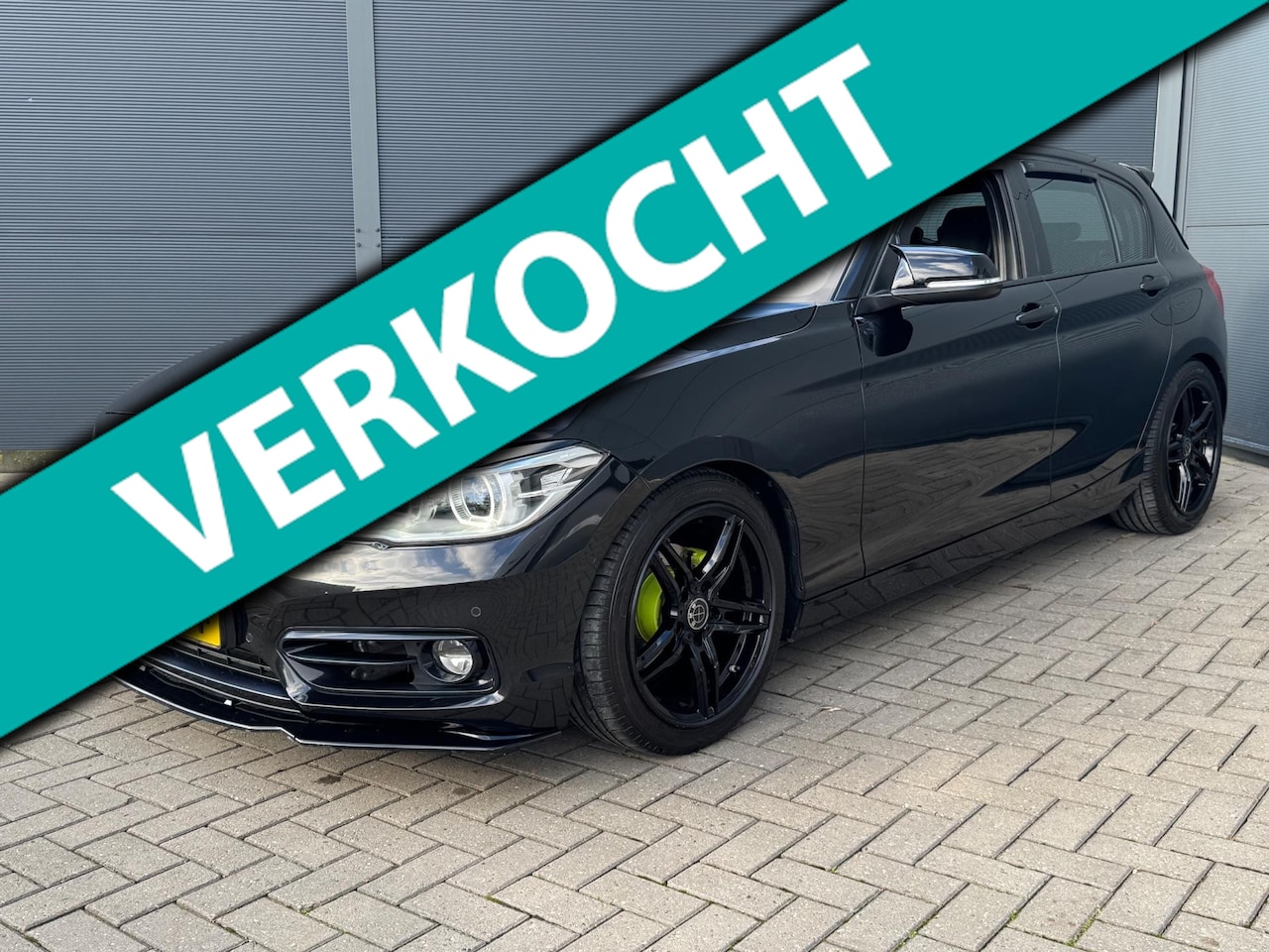 BMW 1-serie - 118i Sport M Edition / Camera / Pdc / Navi / Leer - AutoWereld.nl