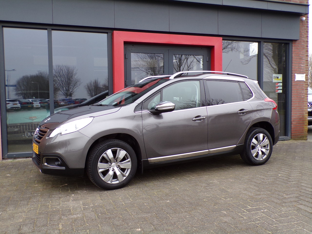 Peugeot 2008 - 1.2 PureTech Allure Panoramadak Cruise Navi NAP - AutoWereld.nl