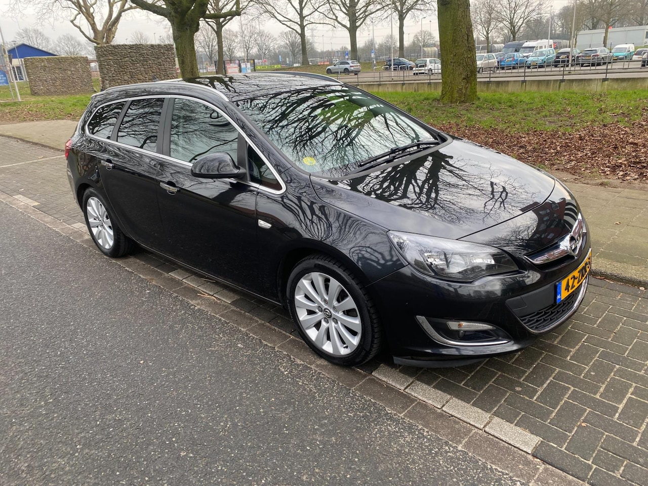 Opel Astra Sports Tourer - 1.7 CDTi S/S Cosmo MET NAVIGATIE EXPORT PRIJS - AutoWereld.nl