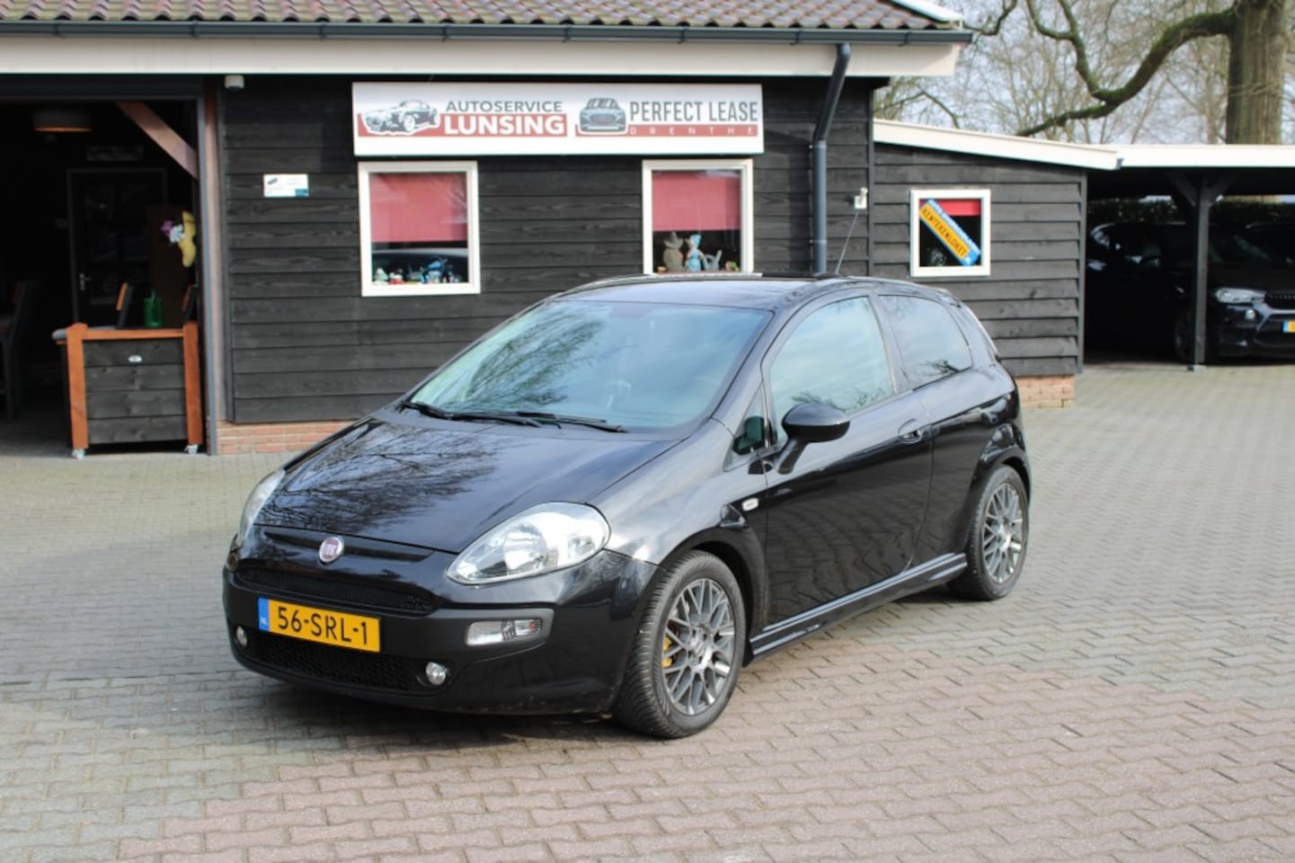 Fiat Punto Evo - EVO 1.3 M-Jet Racing - Nieuwe APK Navi Climate control - AutoWereld.nl