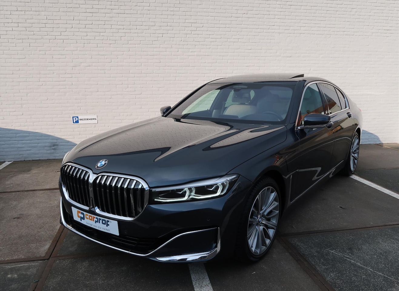 BMW 7-serie - (g11) 745e Automaat High Executive I Mas. en gevent. stoelen I HUD I Harman Kardon I Act. - AutoWereld.nl