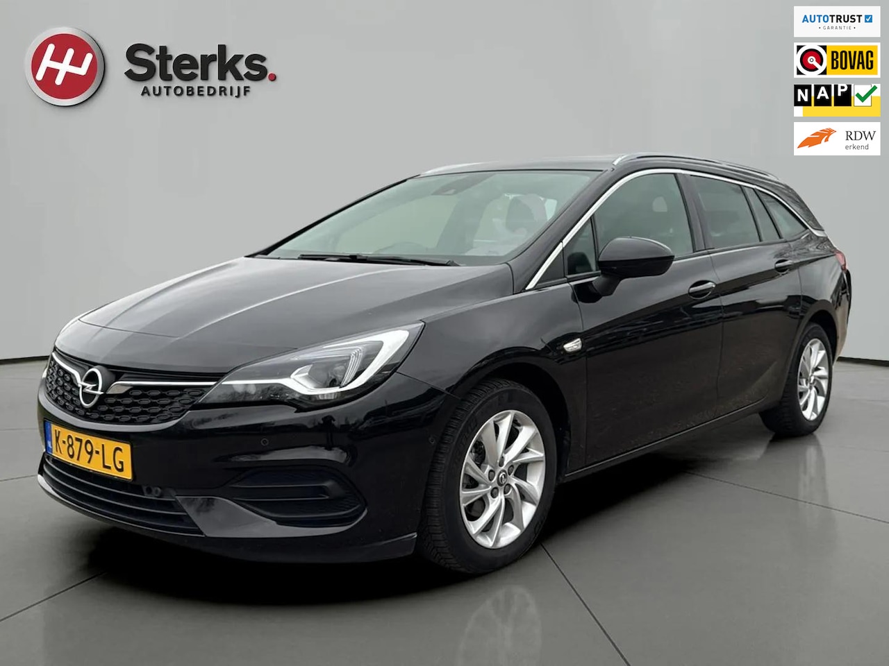 Opel Astra Sports Tourer - 1.2 Elegance 1.2 146 PK !!! DIGITAAL DASHBOARD CAR-PLAY CLIMAAT CONTROL LM VELGEN ZEER MOO - AutoWereld.nl