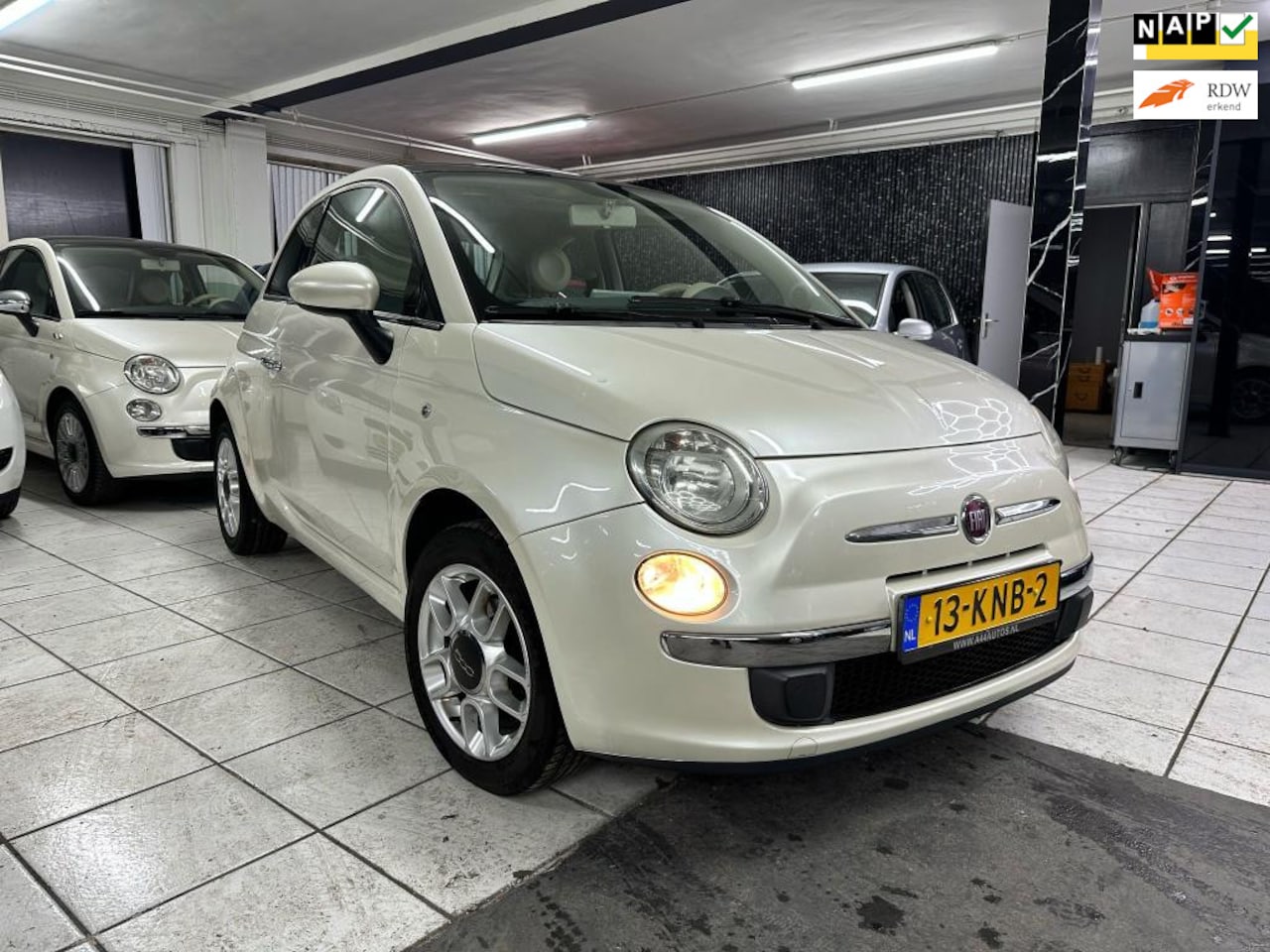 Fiat 500 - 1.2 Lounge Pano\airco\Navi - AutoWereld.nl