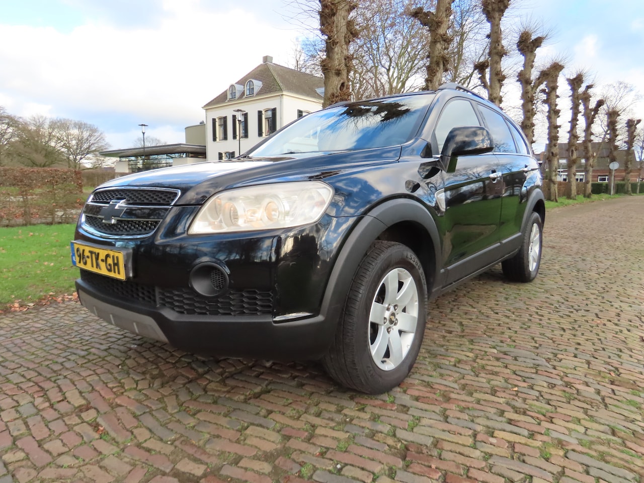 Chevrolet Captiva - 2.4i Style 2WD Airco Cruisecontrol Xenon Pdc 7 Persoons Lm Velgen Trekhaak - AutoWereld.nl