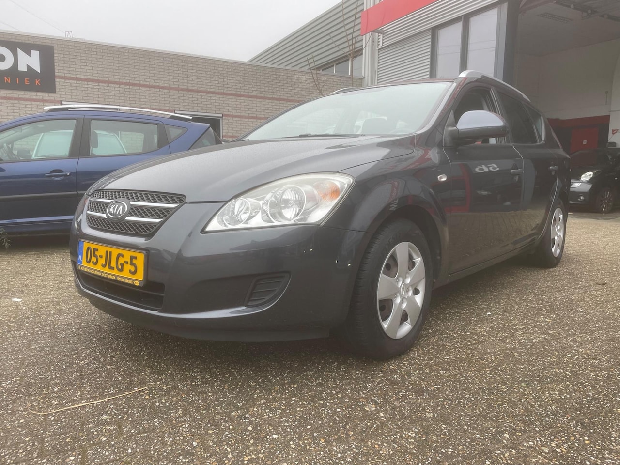 Kia Cee'd Sporty Wagon - 1.4 X-tra ISG nette auto - AutoWereld.nl