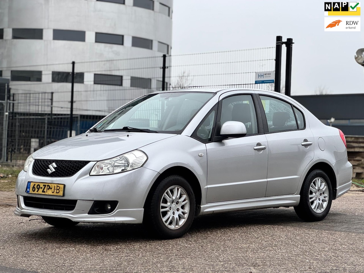 Suzuki SX4 - 1.6 Exclusive/PSENSOR/CRUISE/AIRCO/NIEUW OLIE EN FILTER - AutoWereld.nl