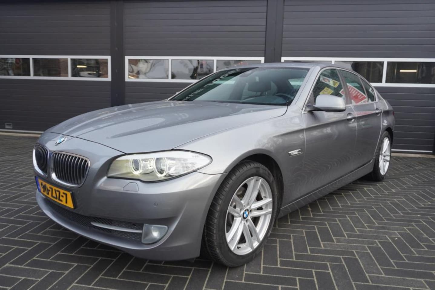 BMW 5-serie - 520i High Executive Aut/Airco/Trekhaak/Elek.schuifdak/Navi/CC - AutoWereld.nl