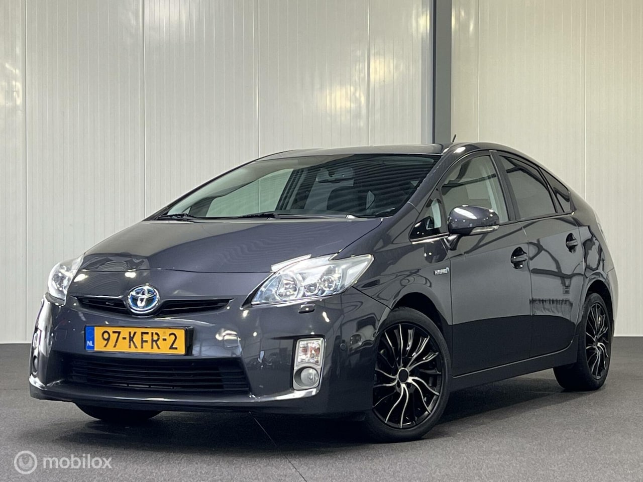 Toyota Prius - 1.8 Dynamic [ NAP climate LM cruise HUD ] - AutoWereld.nl