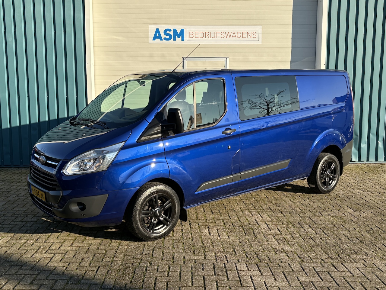 Ford Transit Custom - 310 2.0 131Pk TDCI L2H1 Trend DC / Cruise / Airco / Trekhaak / Apk t/m 11-07-2025 - AutoWereld.nl