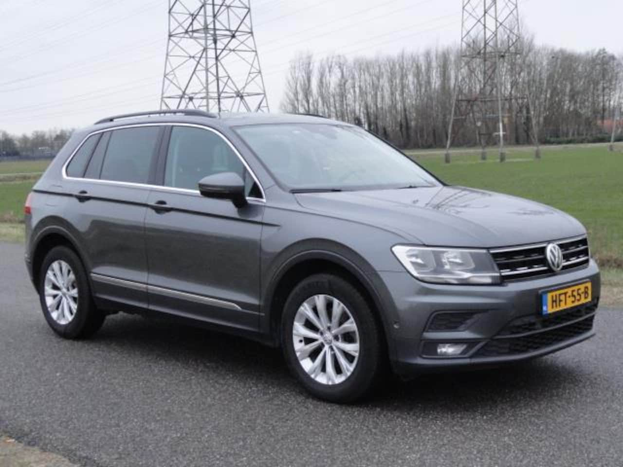 Volkswagen Tiguan - 2.0TDI Comfortline Met ECC I NAVIG I ANDROID - AutoWereld.nl