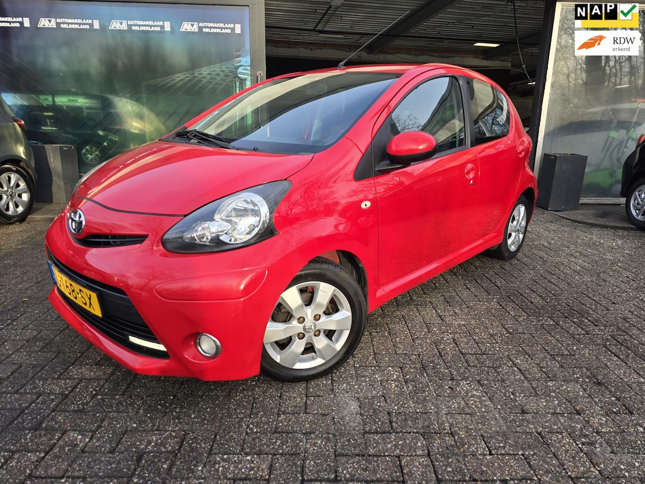 Toyota Aygo - 1.0-12V Sport | 12MND GARANTIE | AIRCO | NW APK | ELEC PAKKET | LMV | - AutoWereld.nl