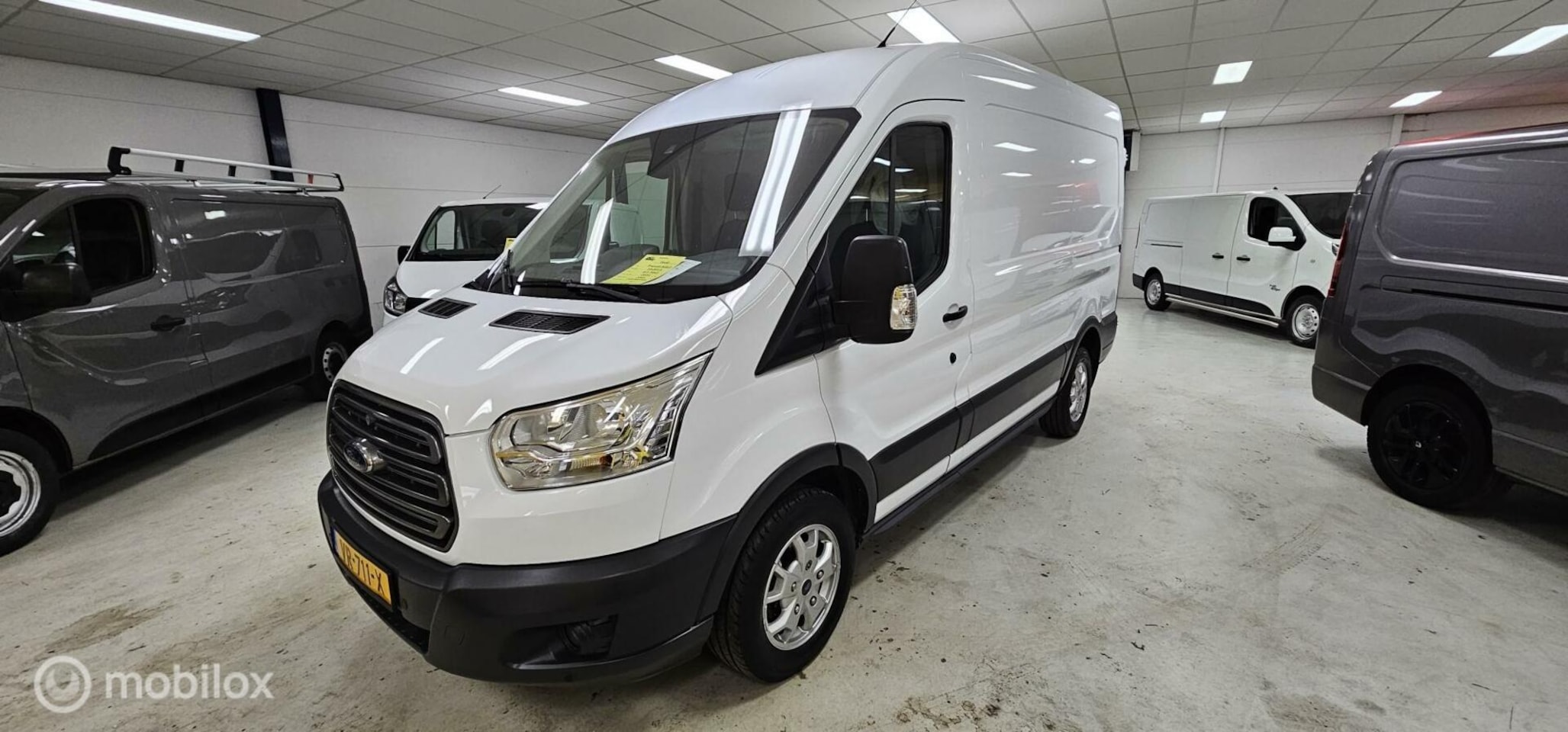 Ford Transit - 310 2.2 TDCI L2H2 Airco Cruise Navi - AutoWereld.nl