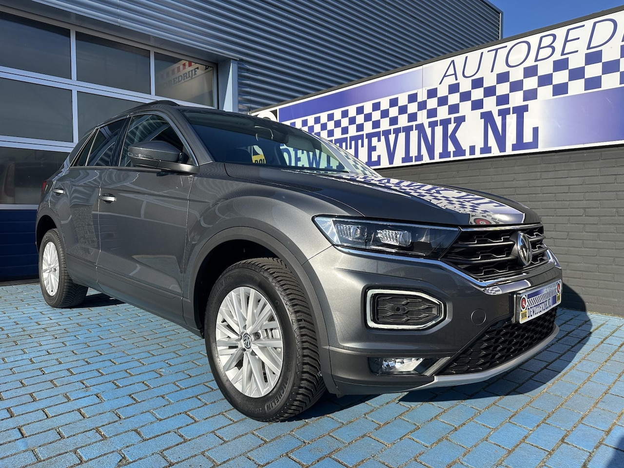 Volkswagen T-Roc - 1.5 TSI ADAP CRUISE NAVI PDC ALL SEASON - AutoWereld.nl