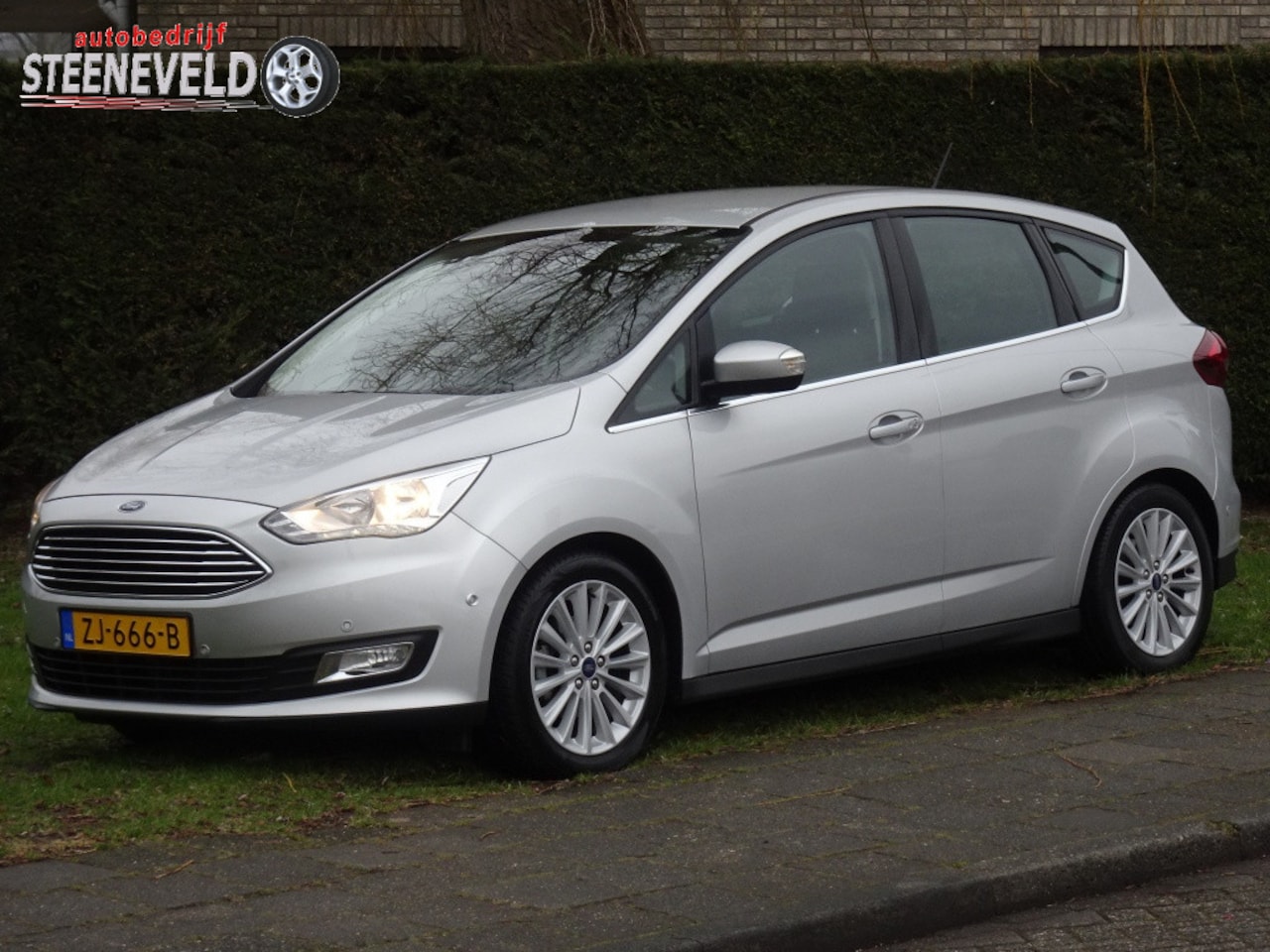 Ford C-Max - 1.0 125pk Titanium met Navi, Camera en Trekhaak - AutoWereld.nl