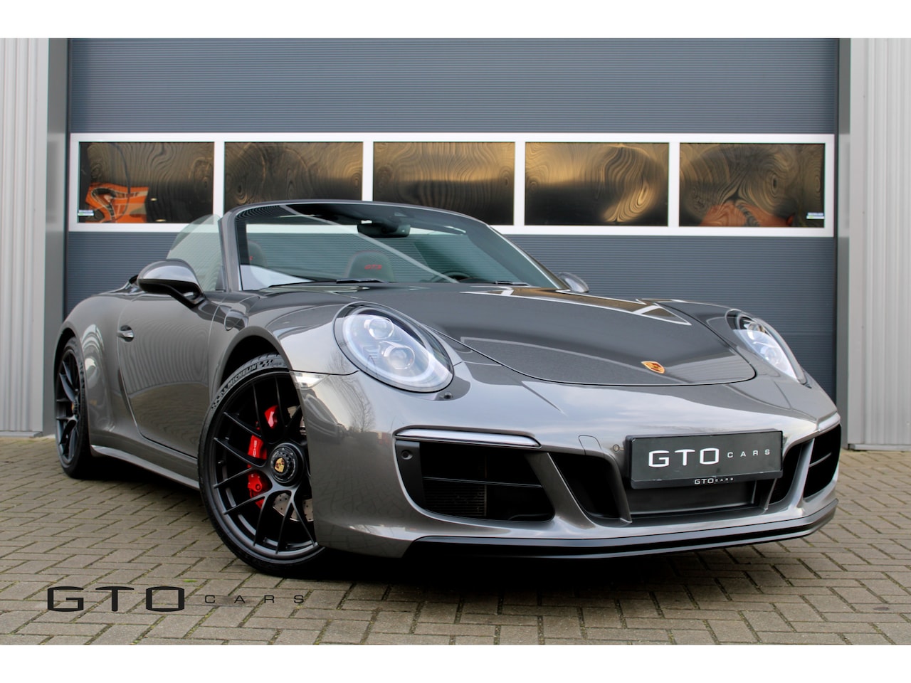 Porsche 911 Cabrio - 3.0 Carrera 4 GTS Carbon/BOSE/Camera/PDLS+/Keyless/Dealer onderhouden - AutoWereld.nl