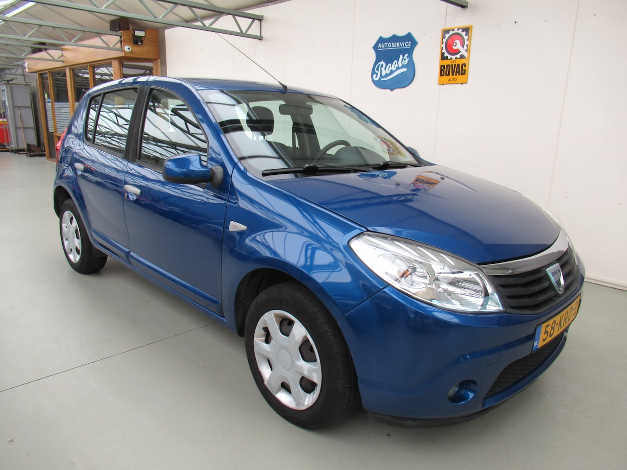 Dacia Sandero - 1.2 Lauréate AIRCO*SB*ELEC-RAMEN. - AutoWereld.nl