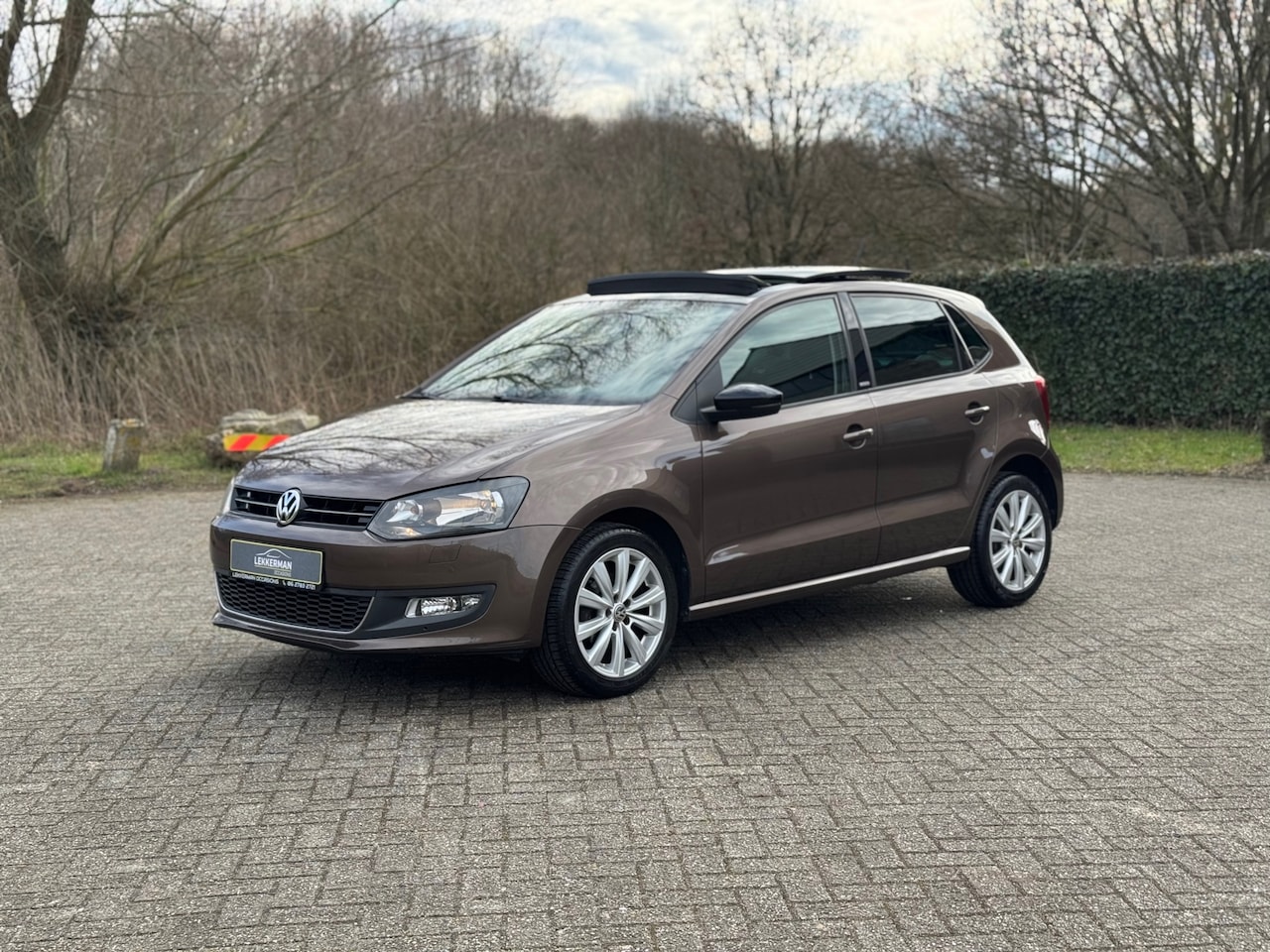 Volkswagen Polo - 1.2 High Line PANO I AIRCO I STOELVERW I NIEUWE KETTING - AutoWereld.nl