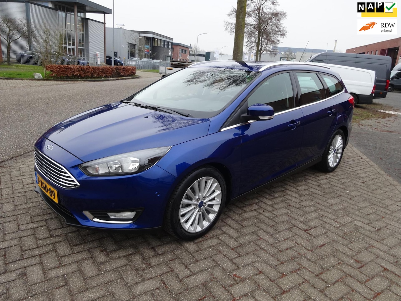 Ford Focus Wagon - 1.0 First Edition/Airco/Navi/Cruise Control/Boekjes - AutoWereld.nl