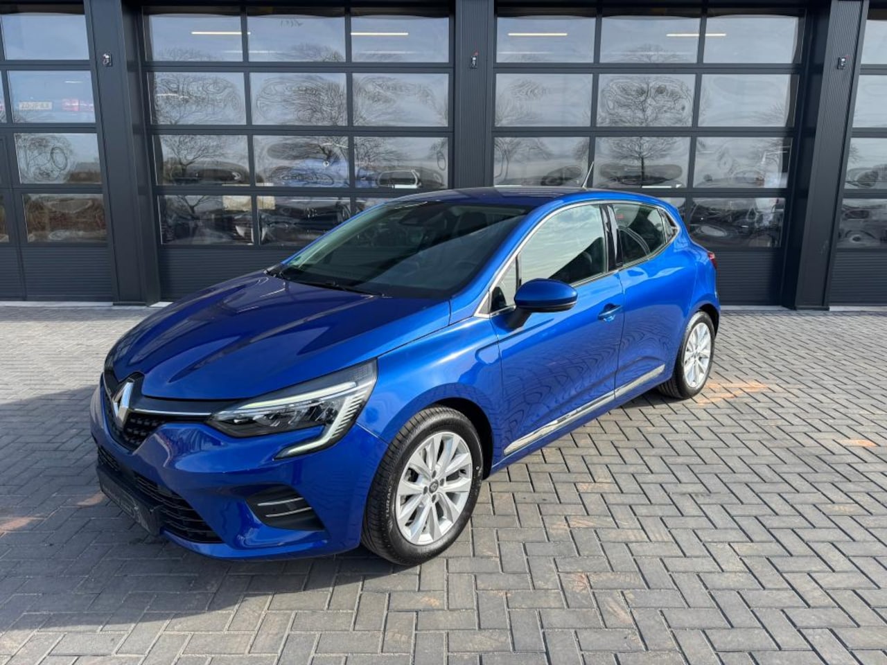 Renault Clio - Renault Clio 1.6 E-Tech Hybrid 140 Intens Groot scherm - AutoWereld.nl