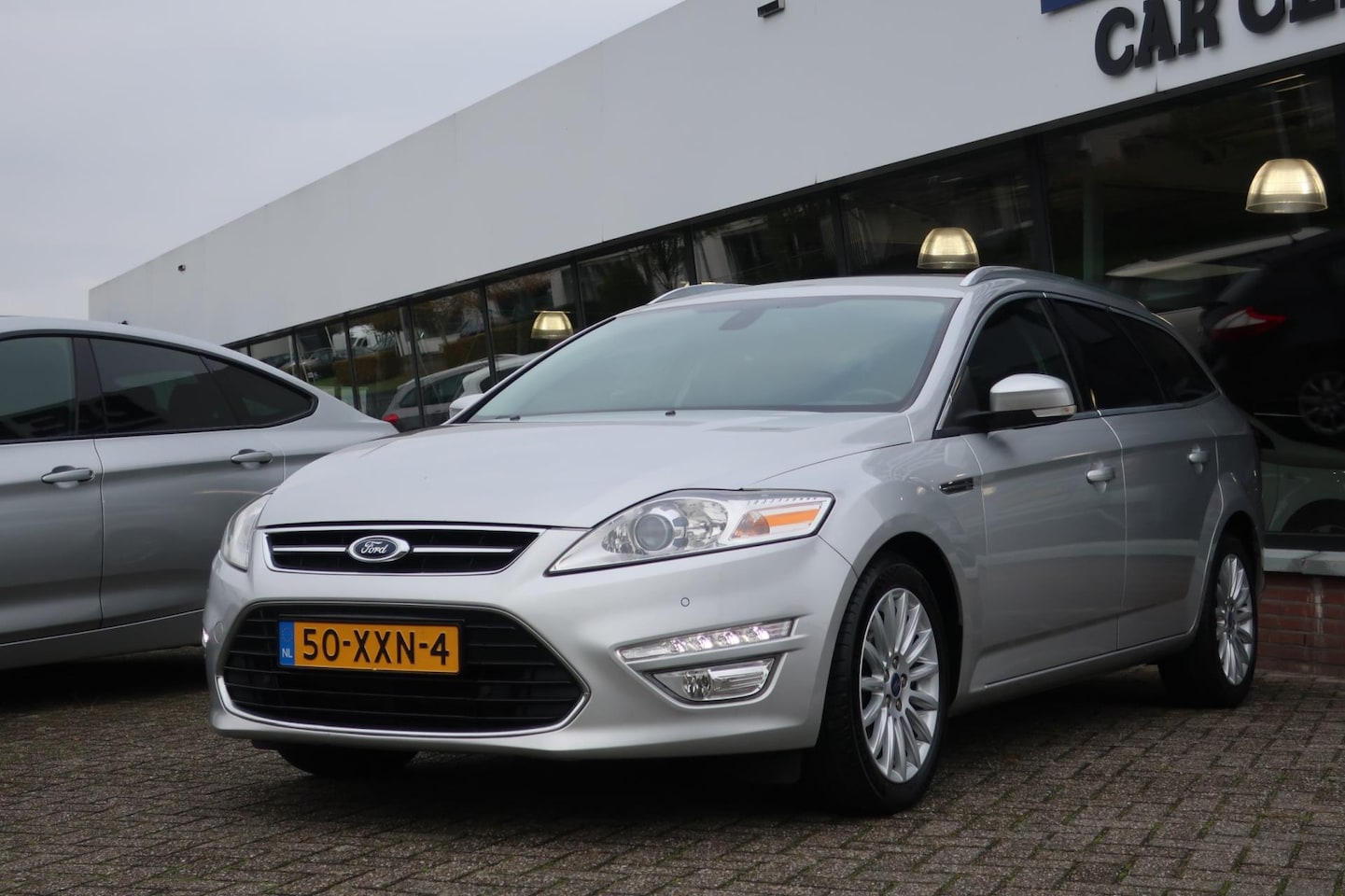 Ford Mondeo Wagon - 1.6 EcoBoost Lease Titanium 1e EIG_GR-NAVI_PDC V+A_18-INCH. - AutoWereld.nl